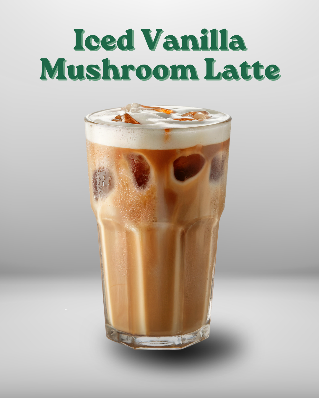 Iced Vanilla Mushroom Latte in a glass with a gray background
